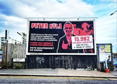 Billboard poster by opponents of Labours Peter Kyle in Hove, pointing to his opposition to a ceasefire and advising people to vote independent or green