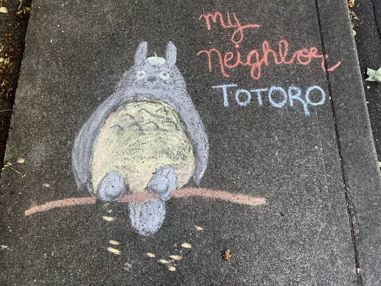 Colourful chalk rendering of what appears to be a Great Horned Owl neighbour. My neighbour TOTORO is the caption. 