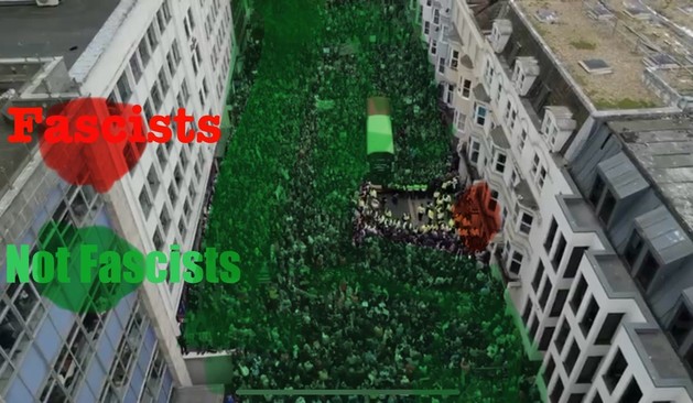 Drone shot of Brighton Queens Road and the fascist/antifascist presence. Photo is colour shaded: Red - small group of fascists, green: huge crowd of antifascists